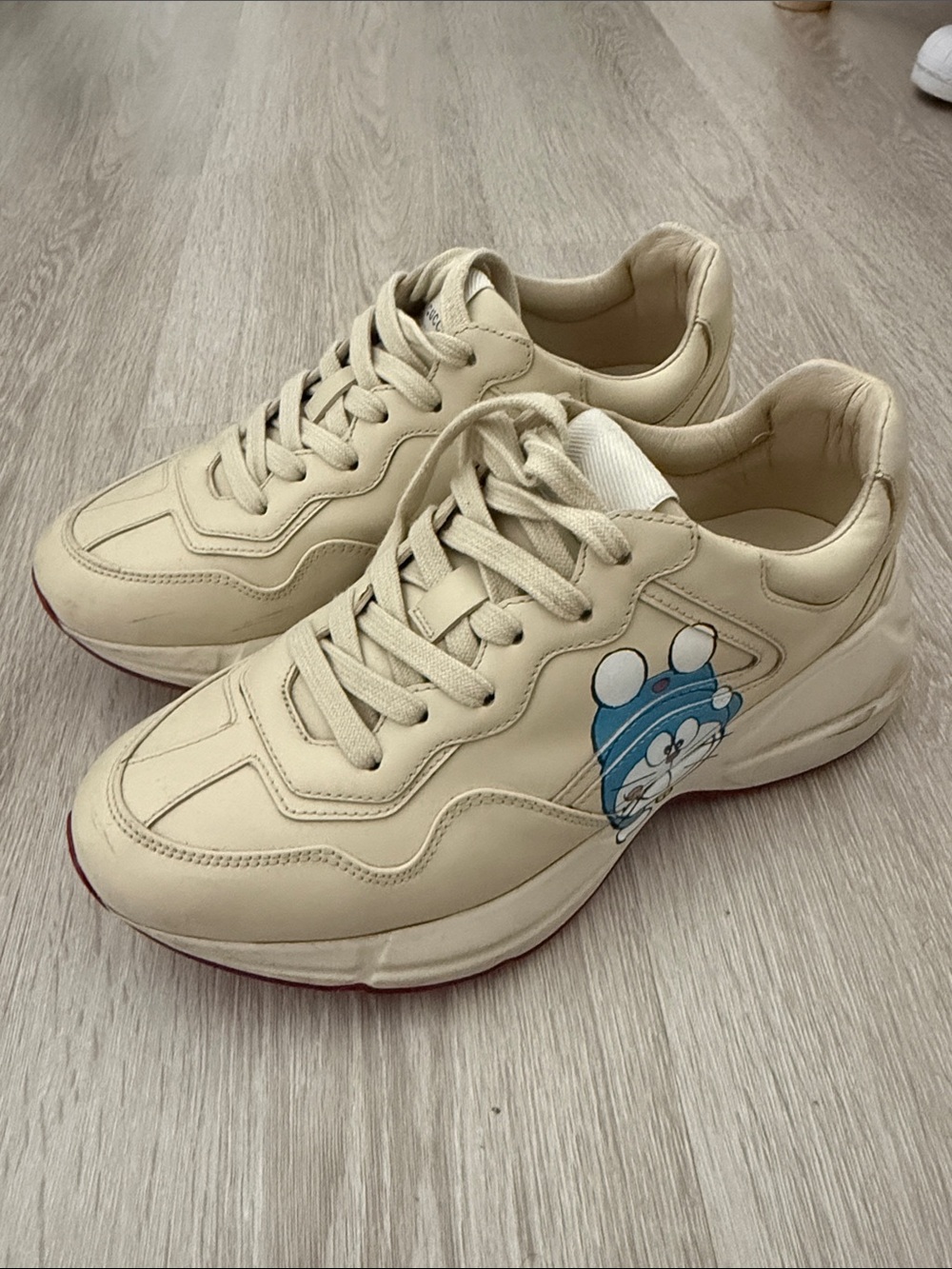 Gucci Beige Casual Sneakers with Cute Blue Character Graphic